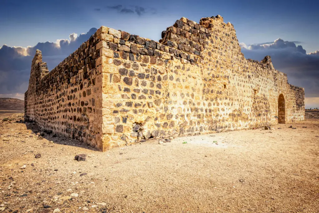 The basalt walls of Qal’at Unaiza