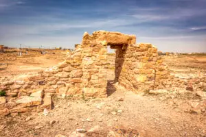 Close view of the stone doorway and its lintel set into a wall at Al-Lahun, Jordan