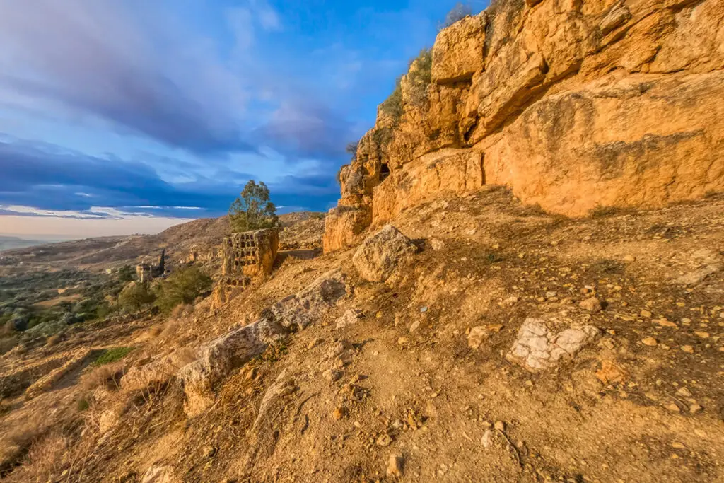 The rocky cliffs of Wadi al-Seer above Iraq al-Amir, with the valley beyond, Jordan