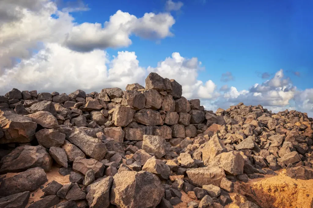 Tumbled basalt ruins of Qasr Uweinid