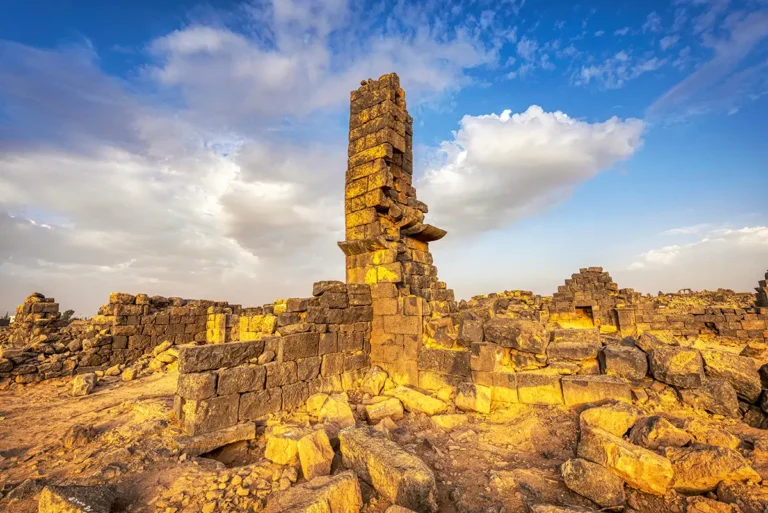 A tall, narrow basalt tower among the ruins, Umm El-Jimal, Jordan