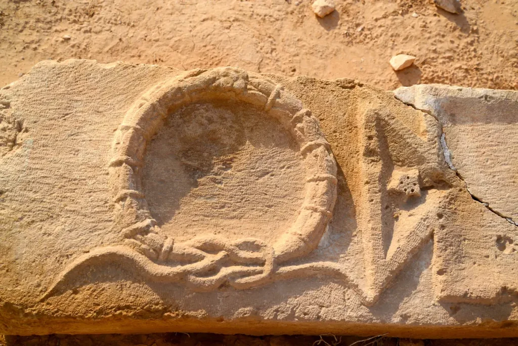A reused Roman lintel carved with a knotted wreath, Hammam As-Sarah, Jordan
