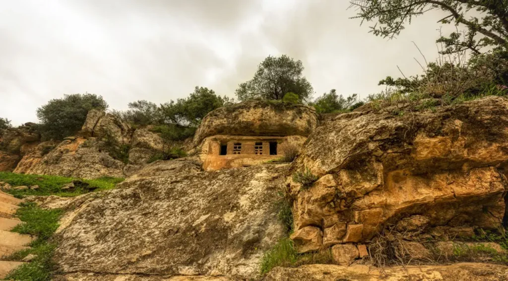 The rock-cut dovecote of Muallaqat al-Dayr high in the cliffs of Wadi al-Seer, Jordan