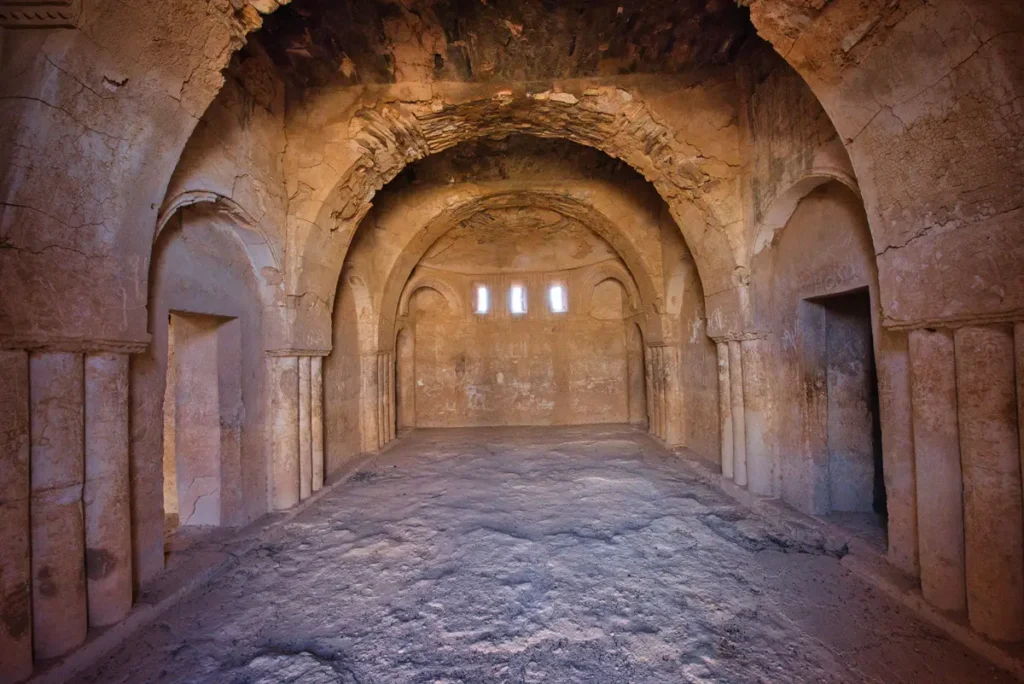 A hall with transverse arches resting on attached columns, Qasr Kharana, Jordan