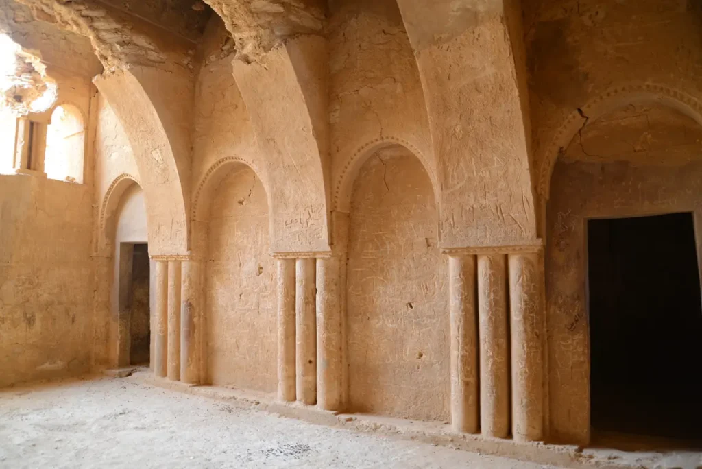 Clusters of small columns and arches in an upper-floor room, Qasr Kharana, Jordan
