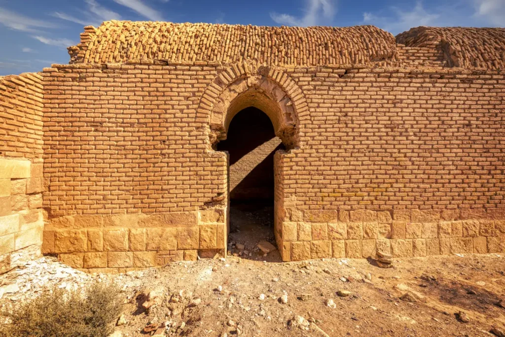 An arched doorway in the brick wall, Qasr Tuba, Jordan