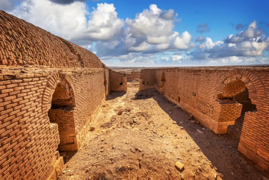 Brick walls on limestone footings around the courtyard, Qasr Tuba, Jordan