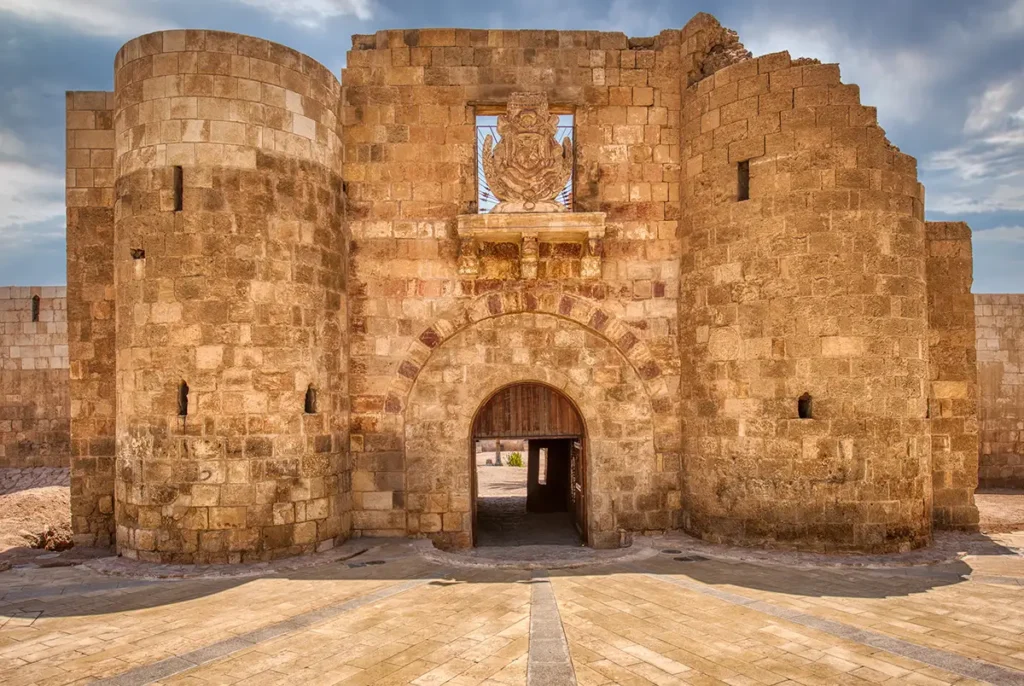 Main gate of Aqaba Fort flanked by two round towers, Aqaba, Jordan
