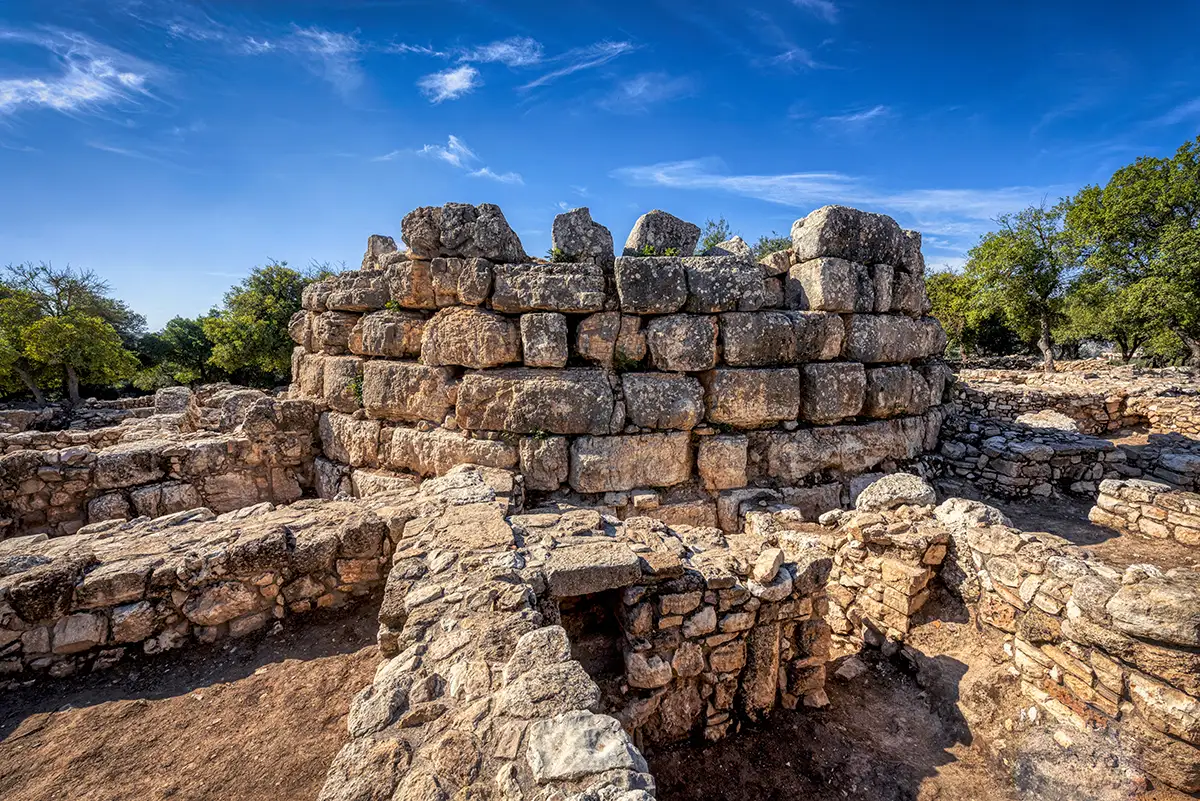Round stone watchtower and surrounding walls at Khirbet Al-Deir, Jordan